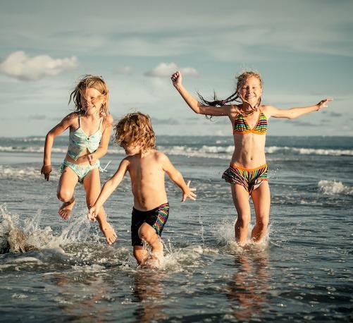 Kids playing in water in Mexico Beach